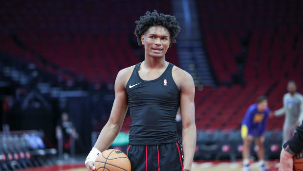 Rockets forward Amen Thompson (1) on the court before the game against the Golden State Warriors at Toyota Center.